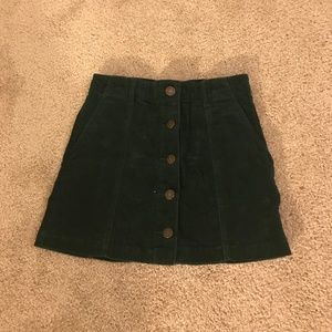 Dark green corduroy skirt with button front